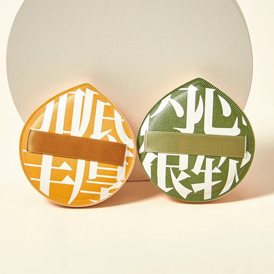 Set of two cotton candy cosmetic puffs – one green and one orange, 6cm super soft sponges for foundation and powder application