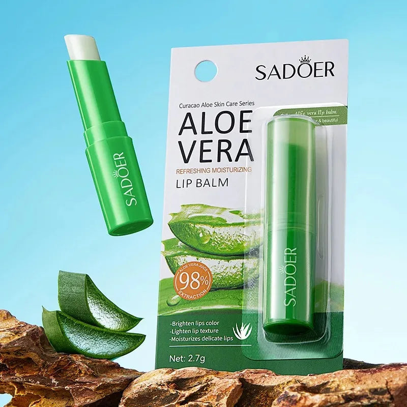 Aloe lip balm stick on sky background with cap open