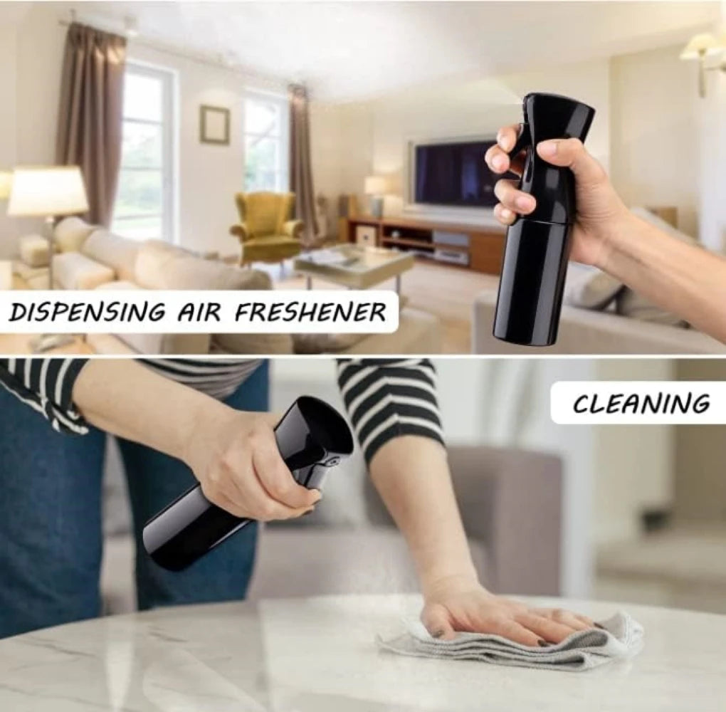 High-pressure atomizer spray bottle being used for cleaning surfaces or dispensing air freshener mist in home or salon setting